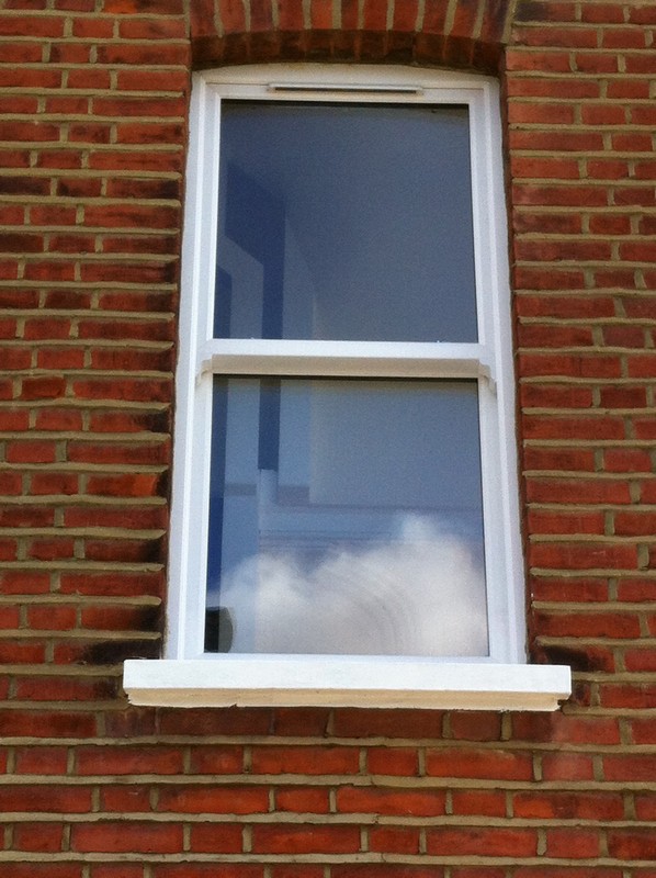 uPVC sash window on Victorian red brick house in Windsor
